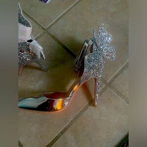 Brand new Silver butterfly heels